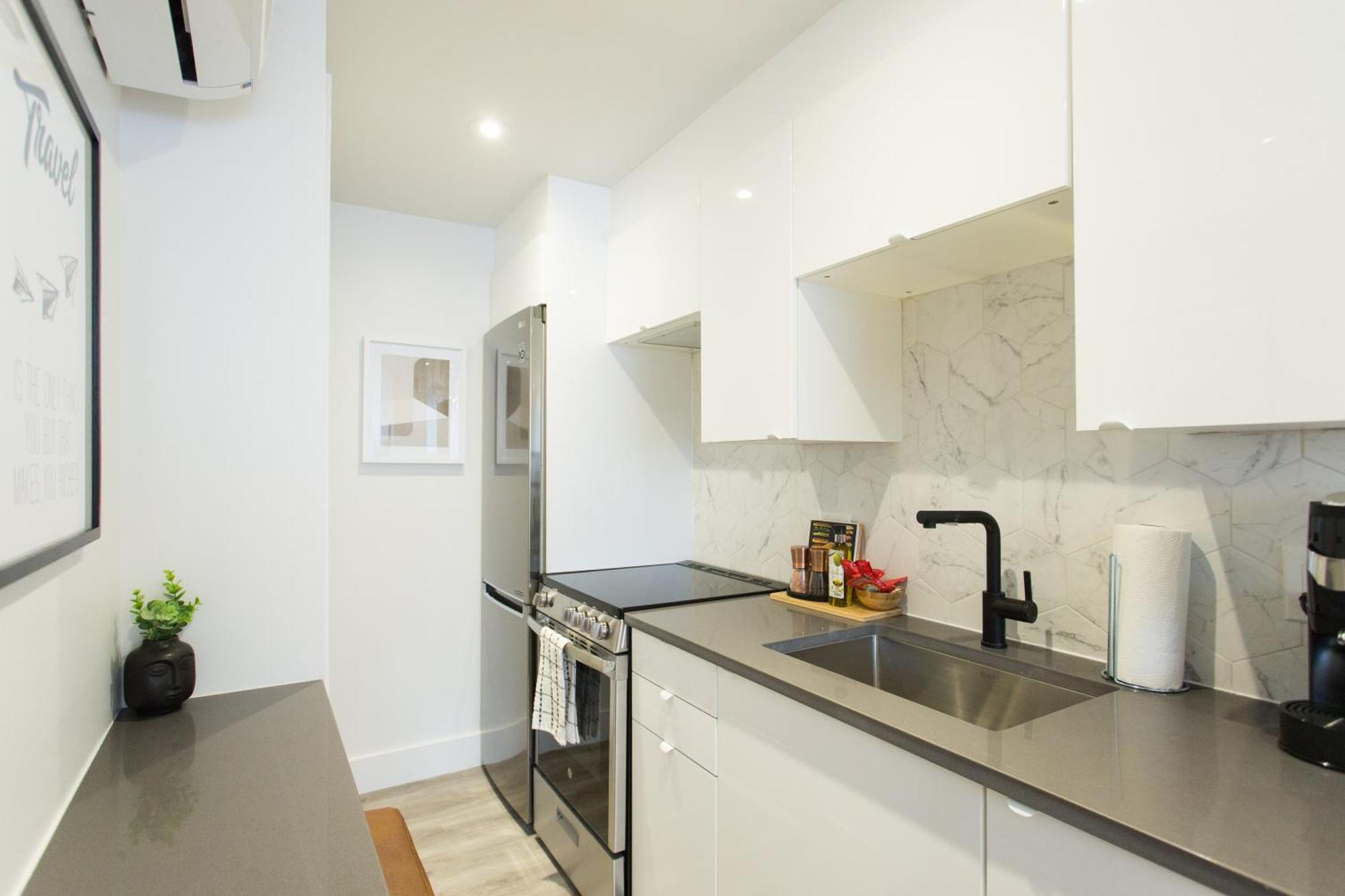 Serene And Styled Little Italy Full Bath By Den Apartamento *